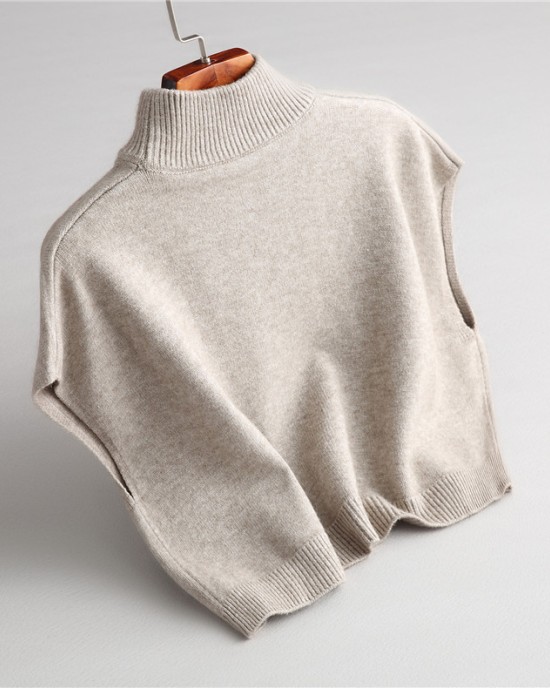 Wearing a low necked small stature with a high necked knitted pullover